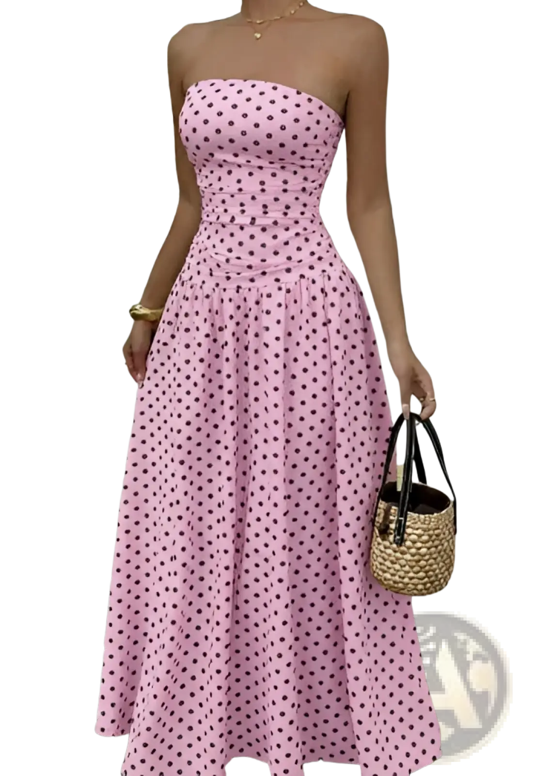 A pink strapless maxi dress with dark polka dots featuring an off shoulder design perfect for formal occasions