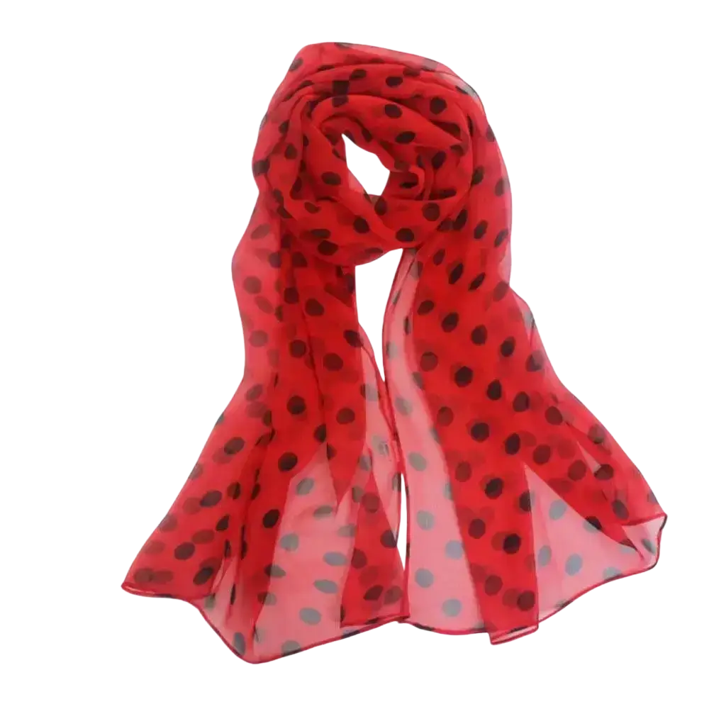A vibrant red silk head wrap scarf with bold black polka dots made from lightweight semi-transparent fabric