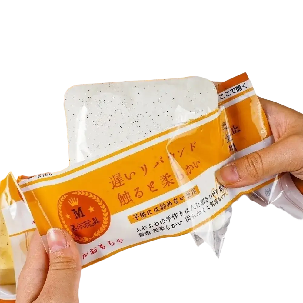 Orange and white polyester acrylic winter scarf with black speckled children’s rubber band packaging