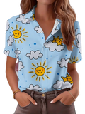 Light blue polyester material short-sleeved casual women shirt with smiling yellow suns and white clouds pattern