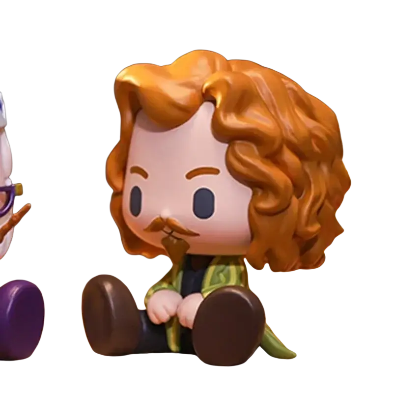 A pop mart harry potter blind box collectible figurine with golden brown curls wearing a green and yellow striped robe
