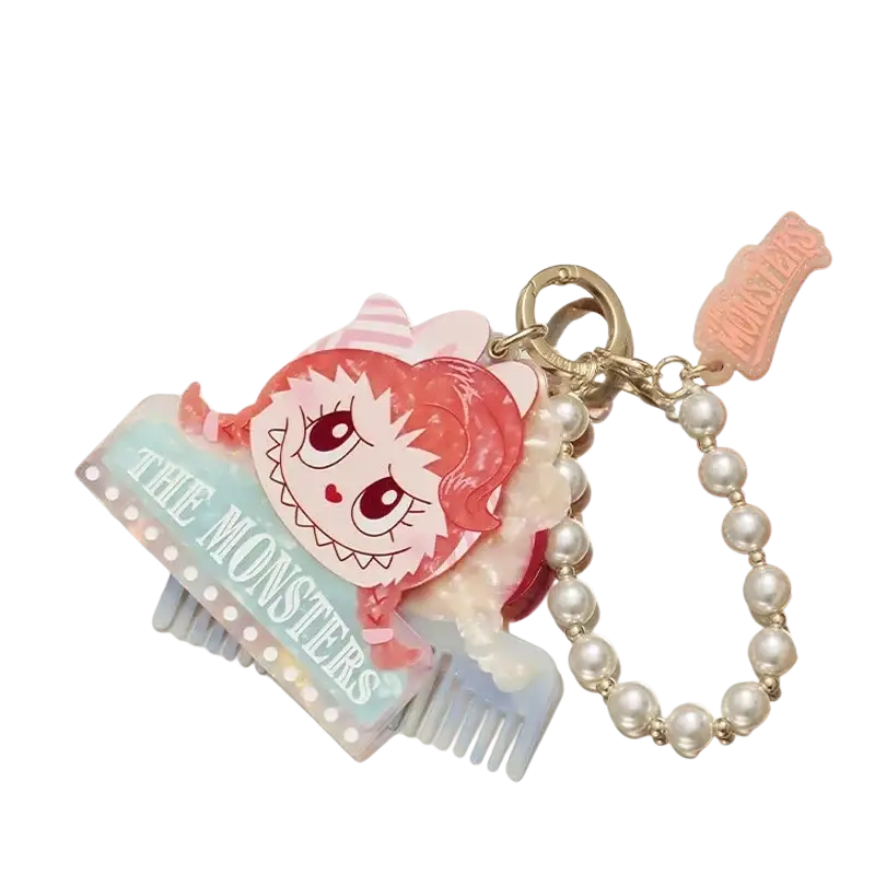 Pink acrylic monster character keychain with pearl beads and comb charm from pop mart labuub the monsters hair salon guess bag