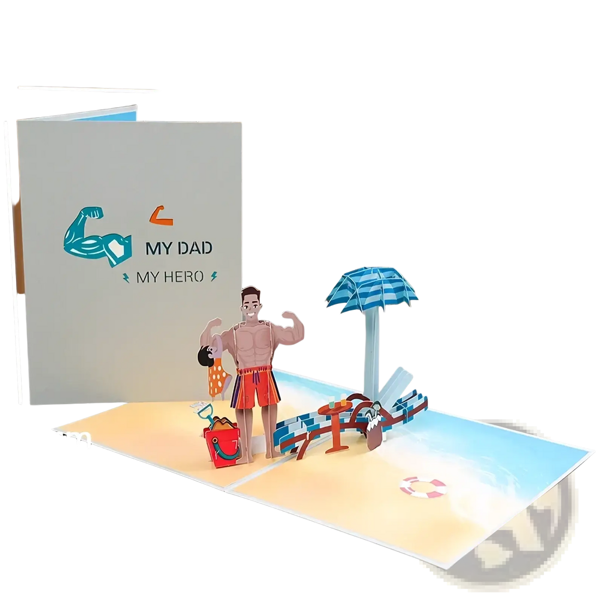 A handmade pop up fathers day card featuring a muscular man in red swim trunks on a beach with umbrella and chairs