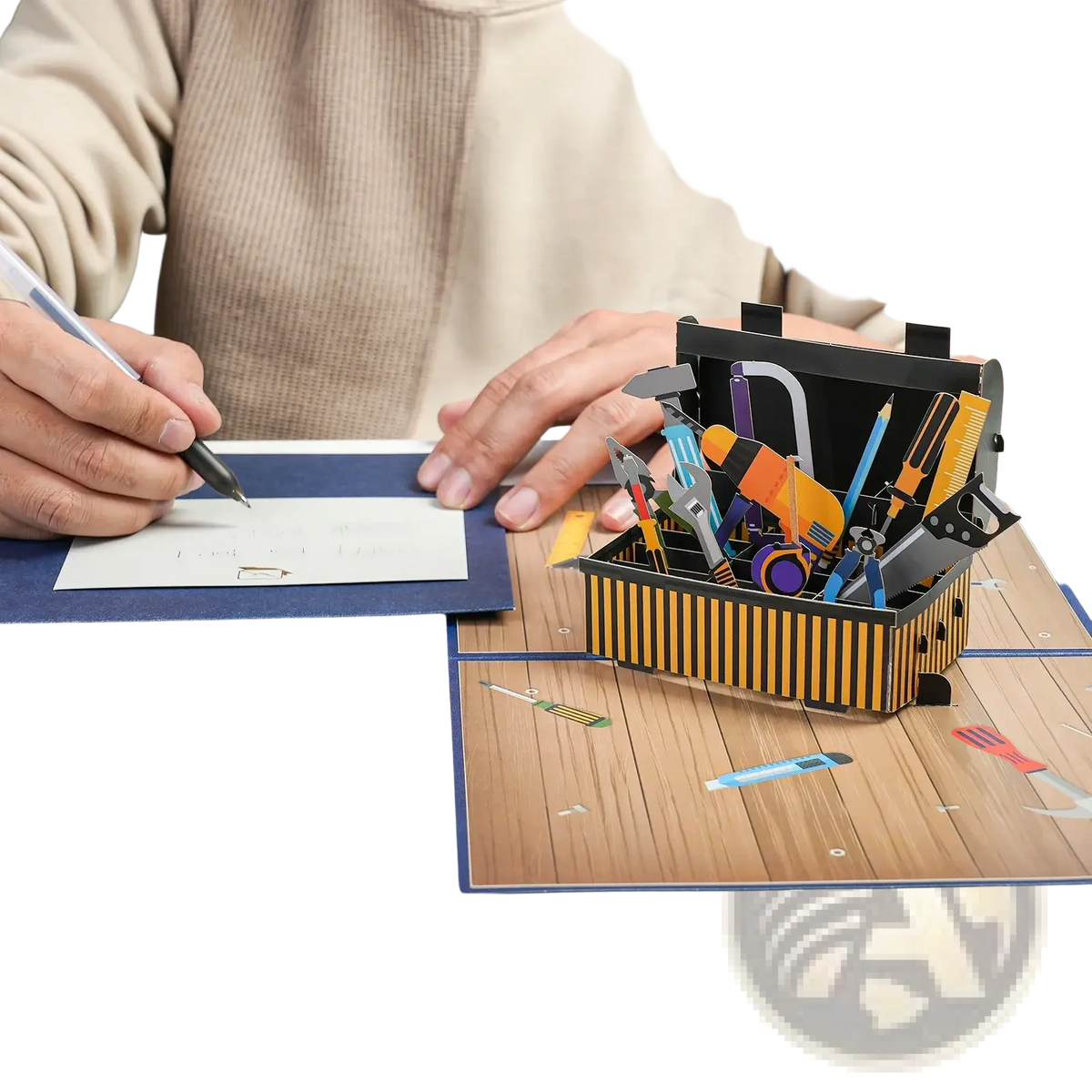 A handmade vibrant 3d pop up fathers day card featuring colorful tools in a striped black and yellow toolbox design
