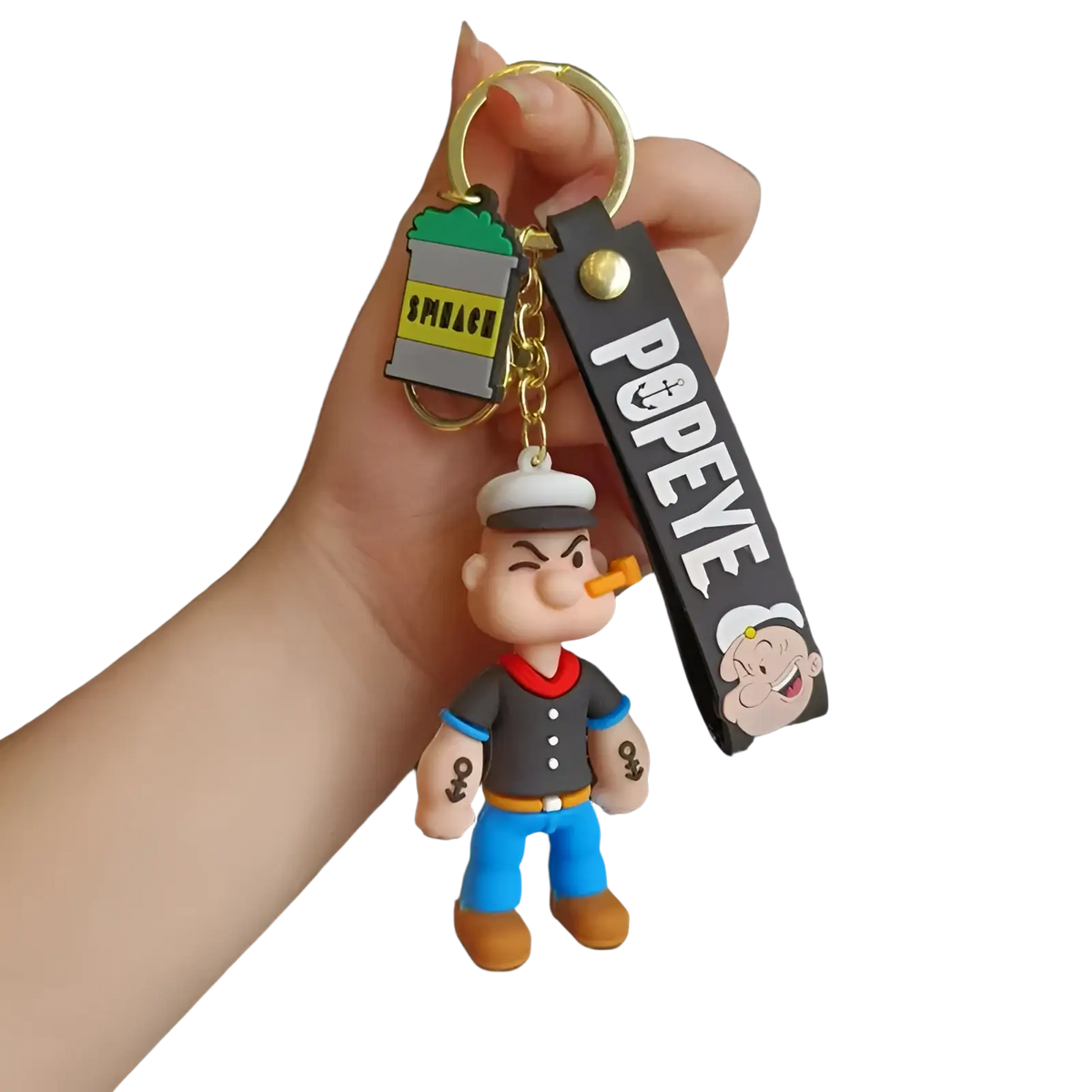Popeye silicone keychain featuring molded plastic figure, gold-toned metal ring and black strap with white lettering