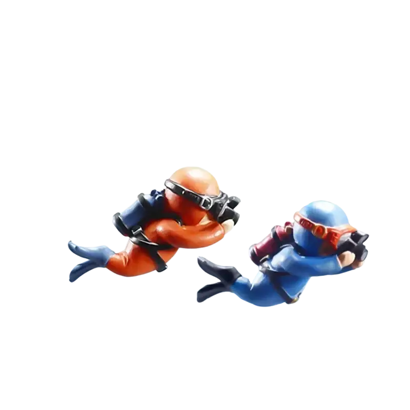 Two cartoonish scuba diver aquarium decorations in orange and blue with black fins for fish tank landscape decor