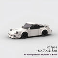 White lego technic model of modified porsche 911 sports car with black wheels and windows from the back side