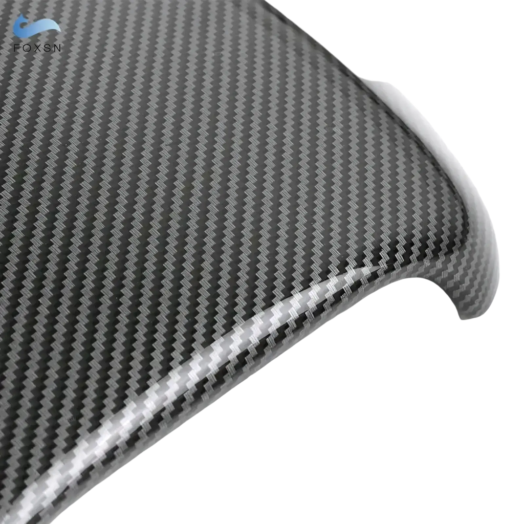 Porsche cayenne carbon console cover 2018-2026 with sleek glossy black carbon fiber diagonal weave pattern