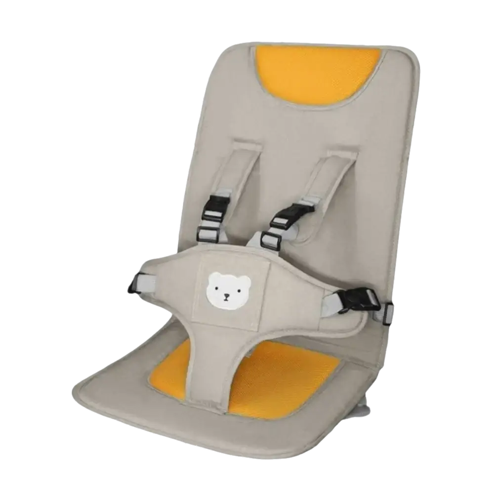 Beige and yellow portable baby car seat booster cushion with a white bear face patch for added comfort and support