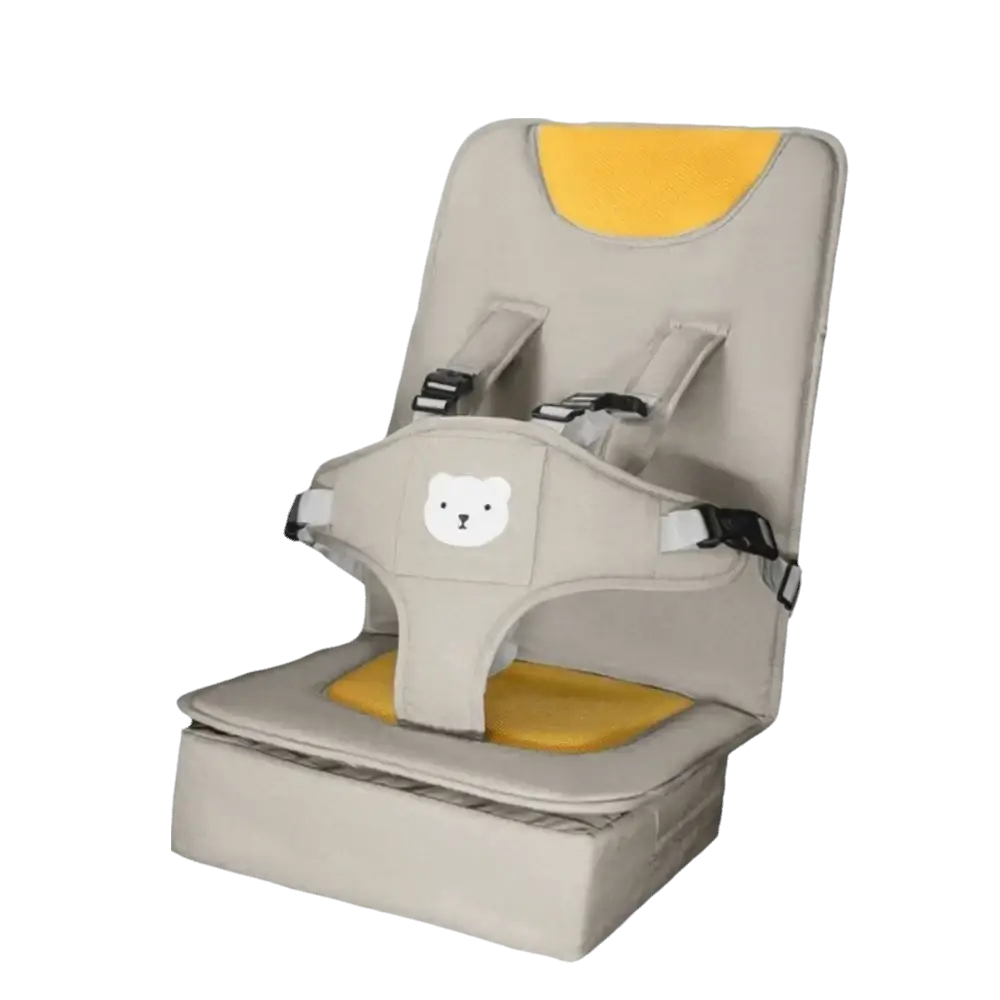 Portable baby car seat booster cushion in beige and yellow with a white bear face patch for child comfort and safety