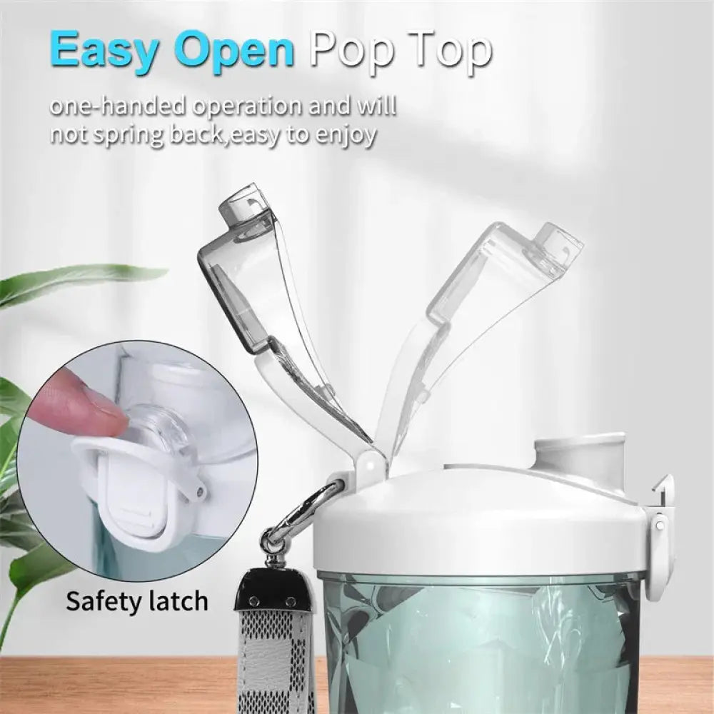 Clear plastic water bottle with white pop-top lid and safety latch for arbaglobal portable 6-blade personal smoothie blender