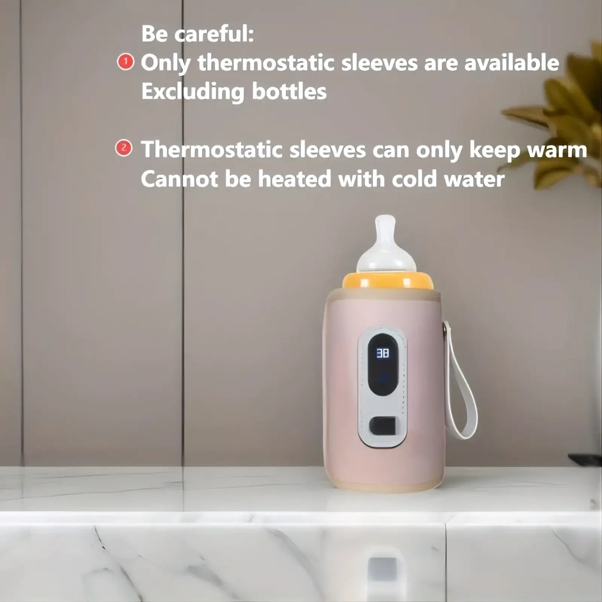 Portable bottle warmer in pink thermosleeve with digital display and strap designed to keep baby bottles warm