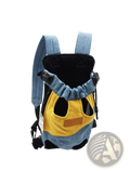 Denim and yellow portable canvas pet backpack carrier with adjustable straps and mesh ventilation shown from the back side