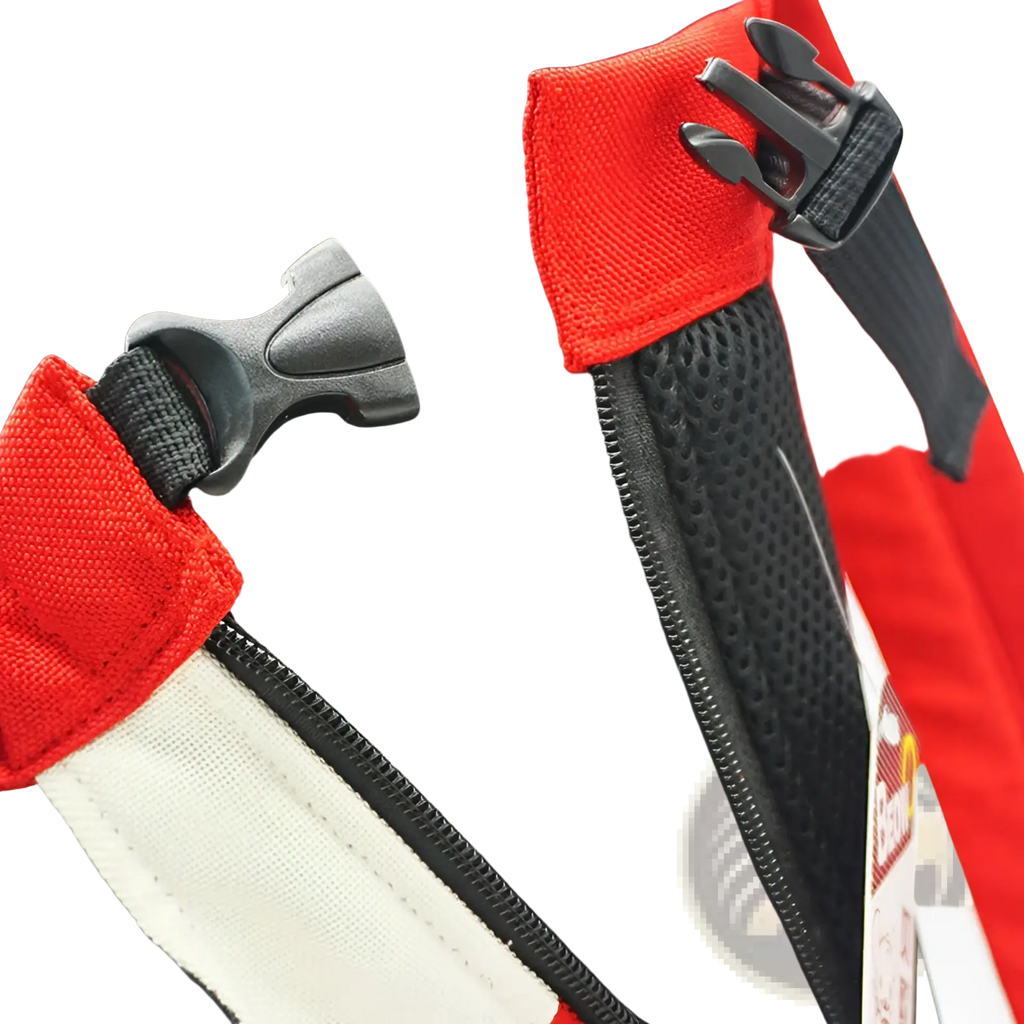 Portable canvas pet backpack carrier in red and black mesh with white trim and plastic buckles visible from the back side