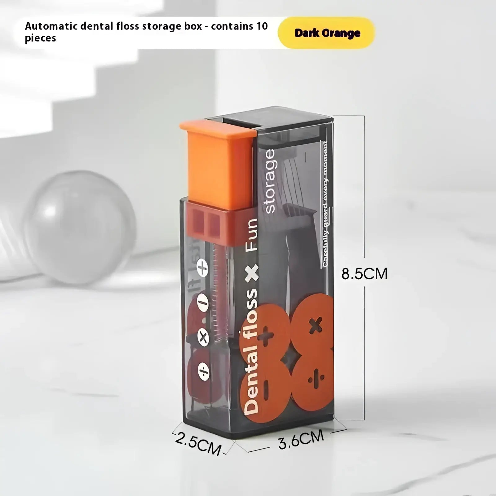 Portable dark orange automatic dental floss box with transparent body and orange cap holds 10 floss pieces