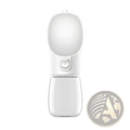 White plastic portable dog water bottle and dispenser with green label and side button for easy use