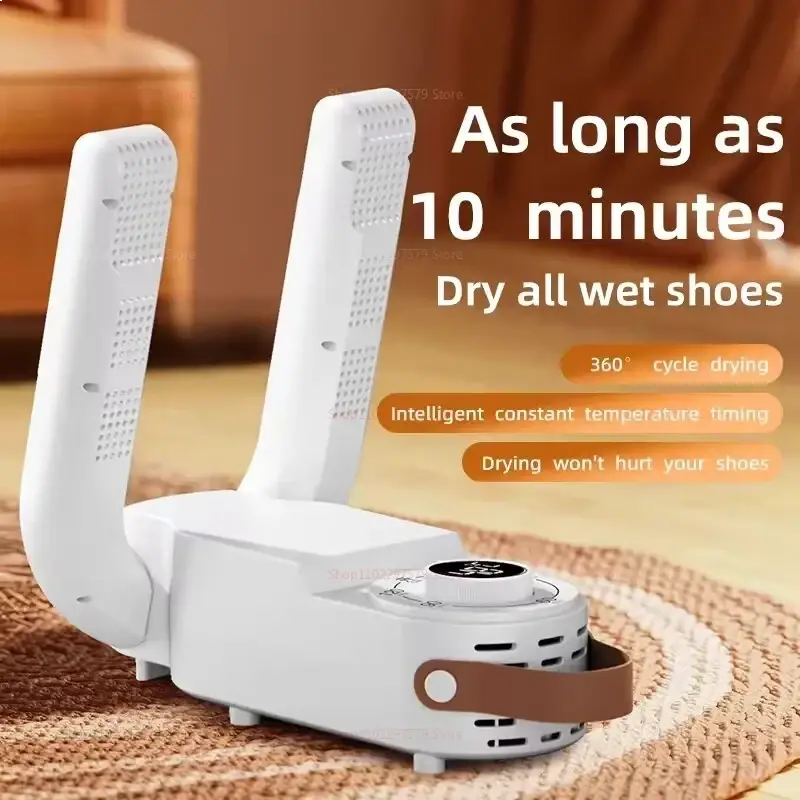 White electric portable shoe dryer with two curved perforated arms and brown leather strap handle for warming shoes