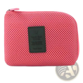 Portable electronic cable travel organizer bag in pink mesh with a dark green leather patch for easy storage