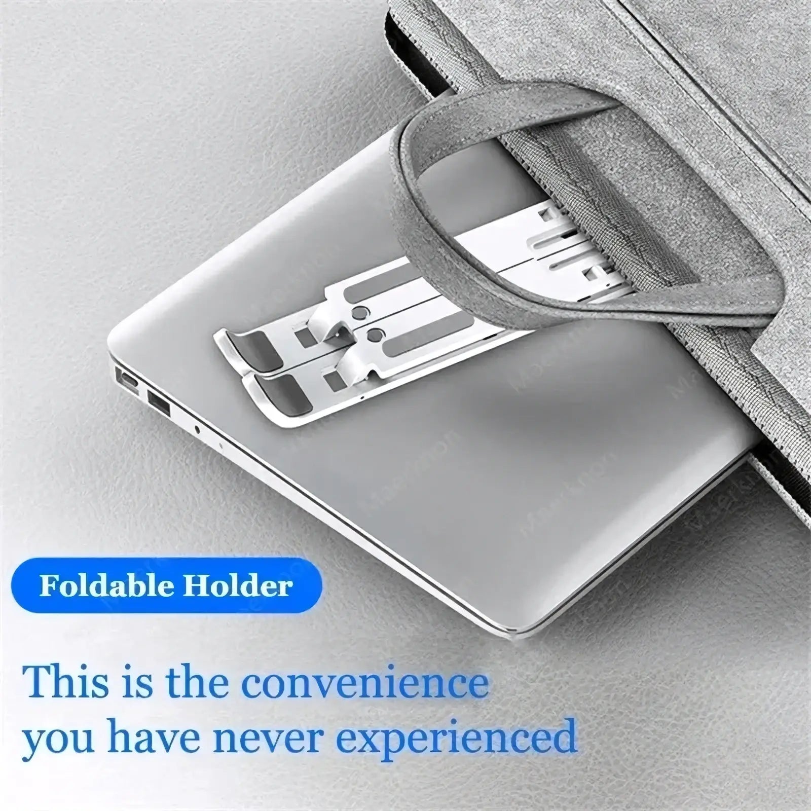 Silver metallic foldable laptop stand with sleek minimalist design for portable adjustable abs holder use