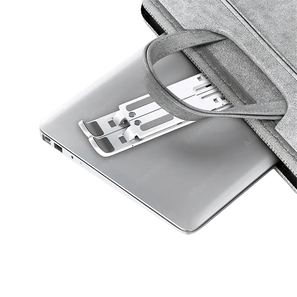 Silver metallic foldable laptop stand with sleek minimalist design for portable adjustable notebook support
