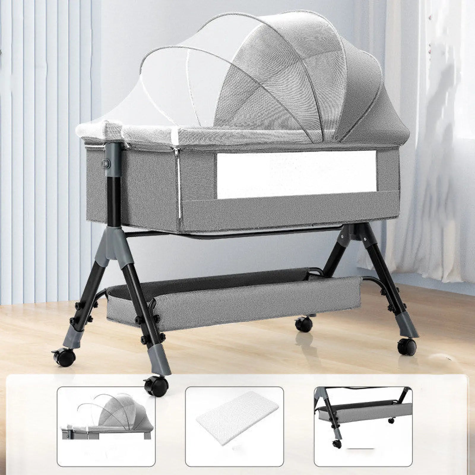 Portable folding baby crib in gray fabric with mesh mosquito net and black metal legs on wheels for mobility
