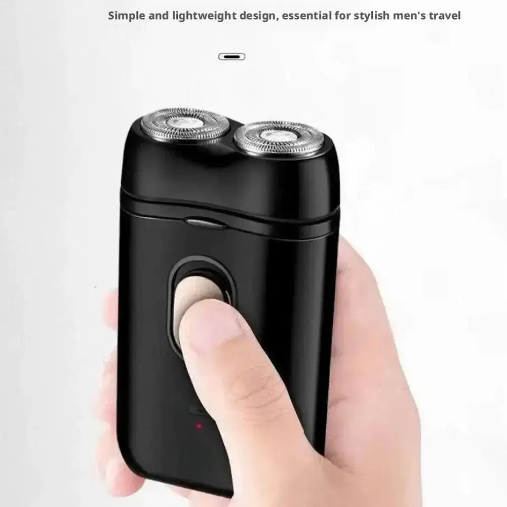 Black dual-blade electric shaver with silver metallic cutting heads sleek compact design usb rechargeable for men