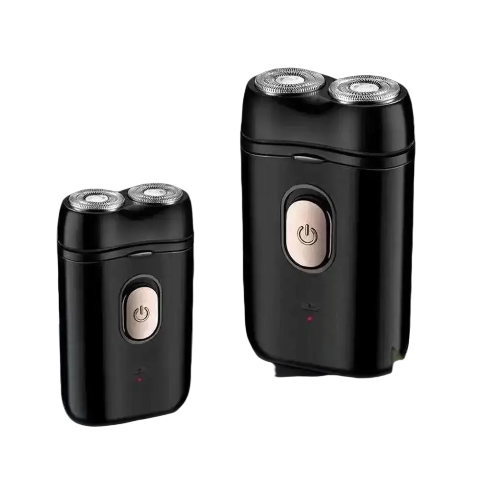 Black portable mini electric shaver for men with silver cutting heads and rose gold usb rechargeable power buttons