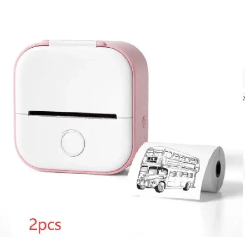 Pink and white portable bluetooth mini thermal label and photo printer printing black and white bus illustration