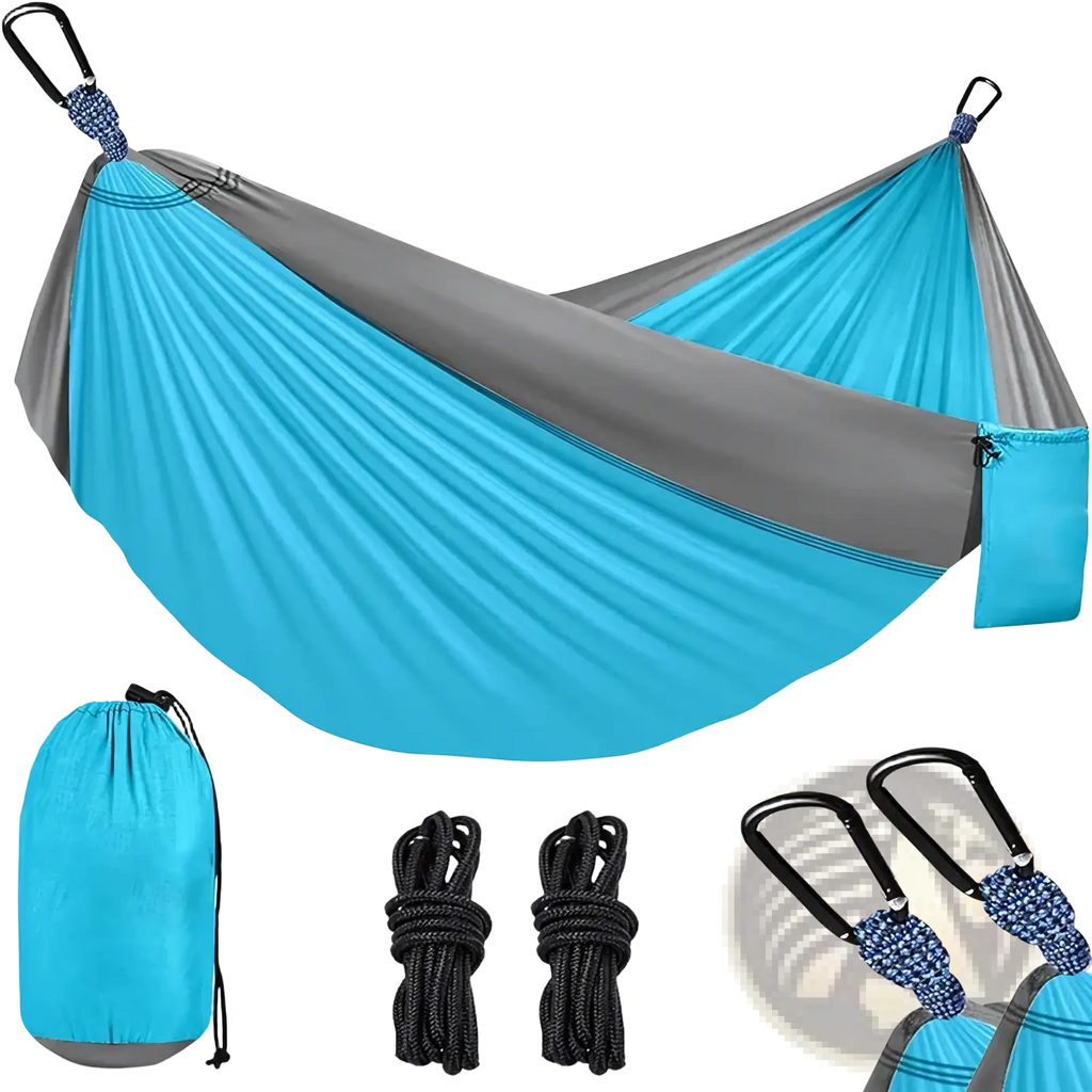 Portable nylon camping hammock in blue and gray stripes with black carabiners and rope for outdoor use