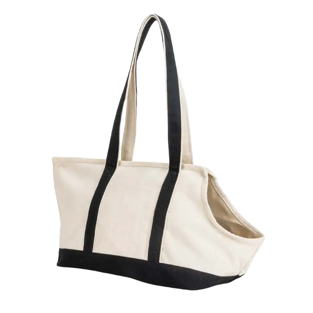 Beige canvas portable pet tote bag with black fabric handles and trim for home business store or business store outdoor use