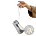 Portable pet water bottle with carbon filter in gray and transparent with ergonomic design and secure carrying strap