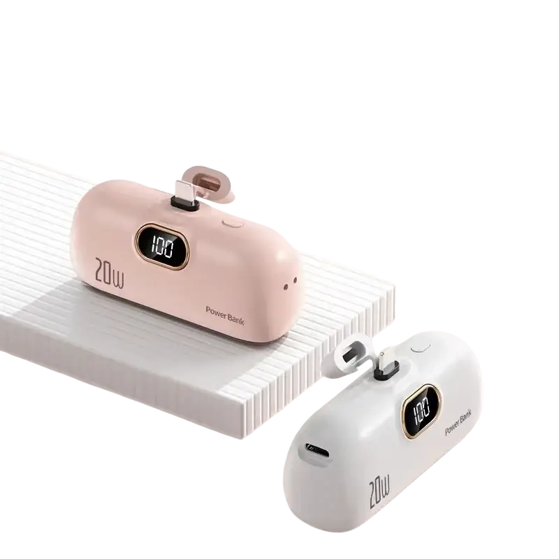 Portable power bank 30000mah fast charger with built-in cables in pink and white showing 100 percent charge digital display