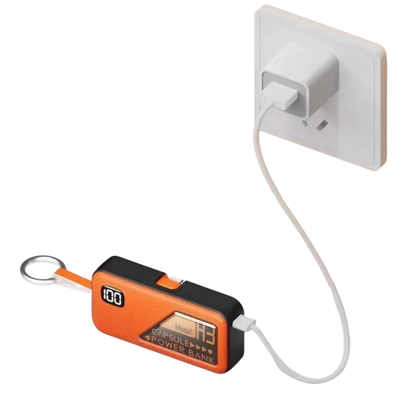 Portable power bank 5000mah orange and black capsule with digital display and type-c fast charging keychain loop