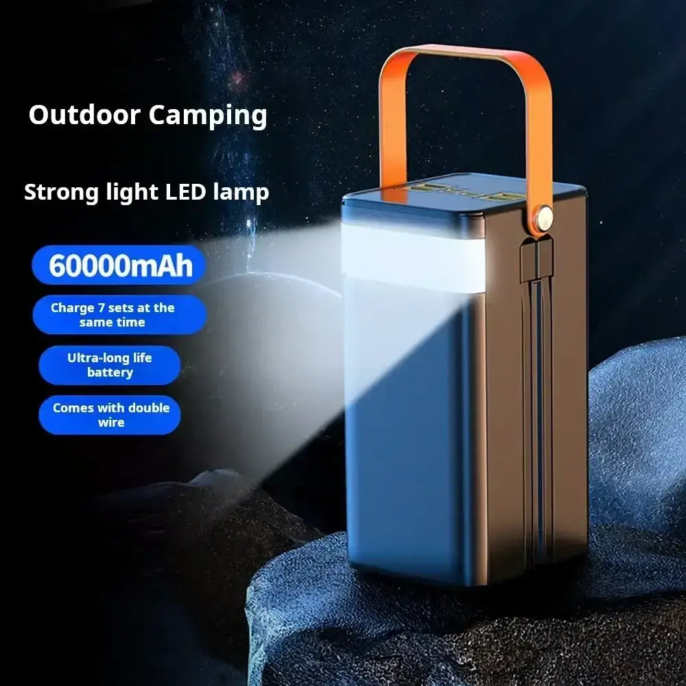 Portable power bank 60000mah 120w fast charging with bronze body and orange handle featuring bright led light and micro input 5v2a