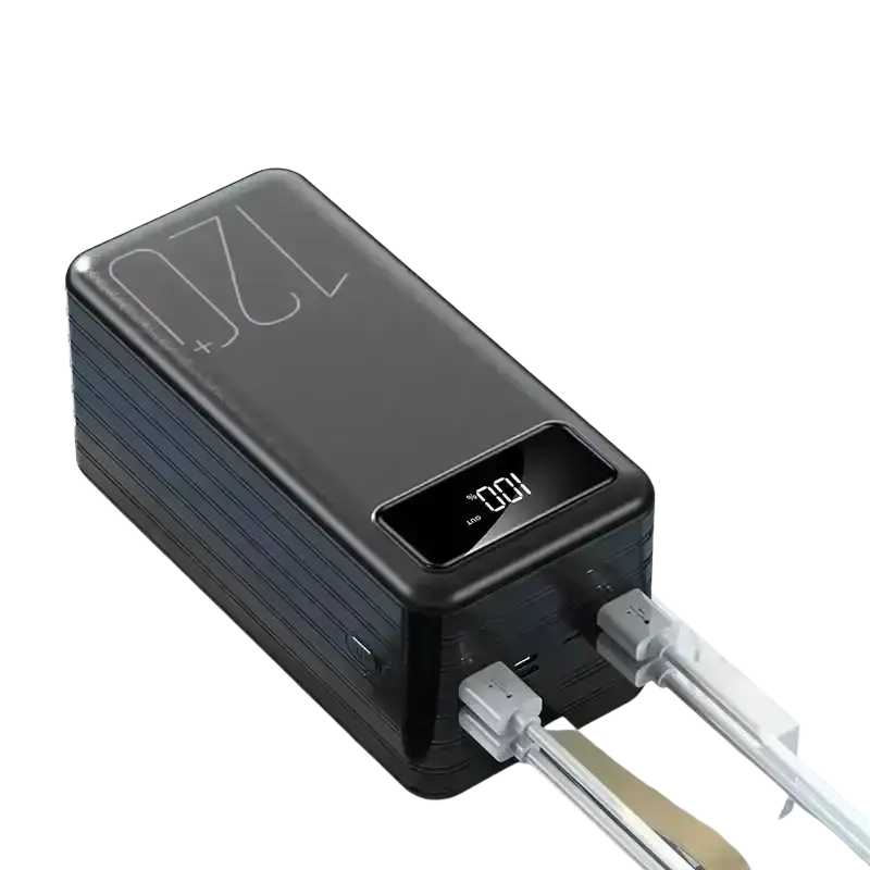Black portable power bank with digital display showing 100 percent and 720 plus etched on surface with multiple usb ports