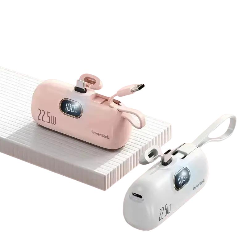 Portable power bank fast charger in pink and white with 30000 mah battery type, digital display, and built-in cables