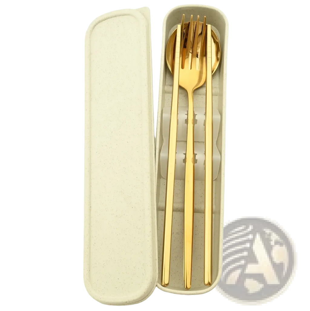 Portable stainless steel cutlery set with gold-colored utensils and beige bamboo storage box neatly arranged