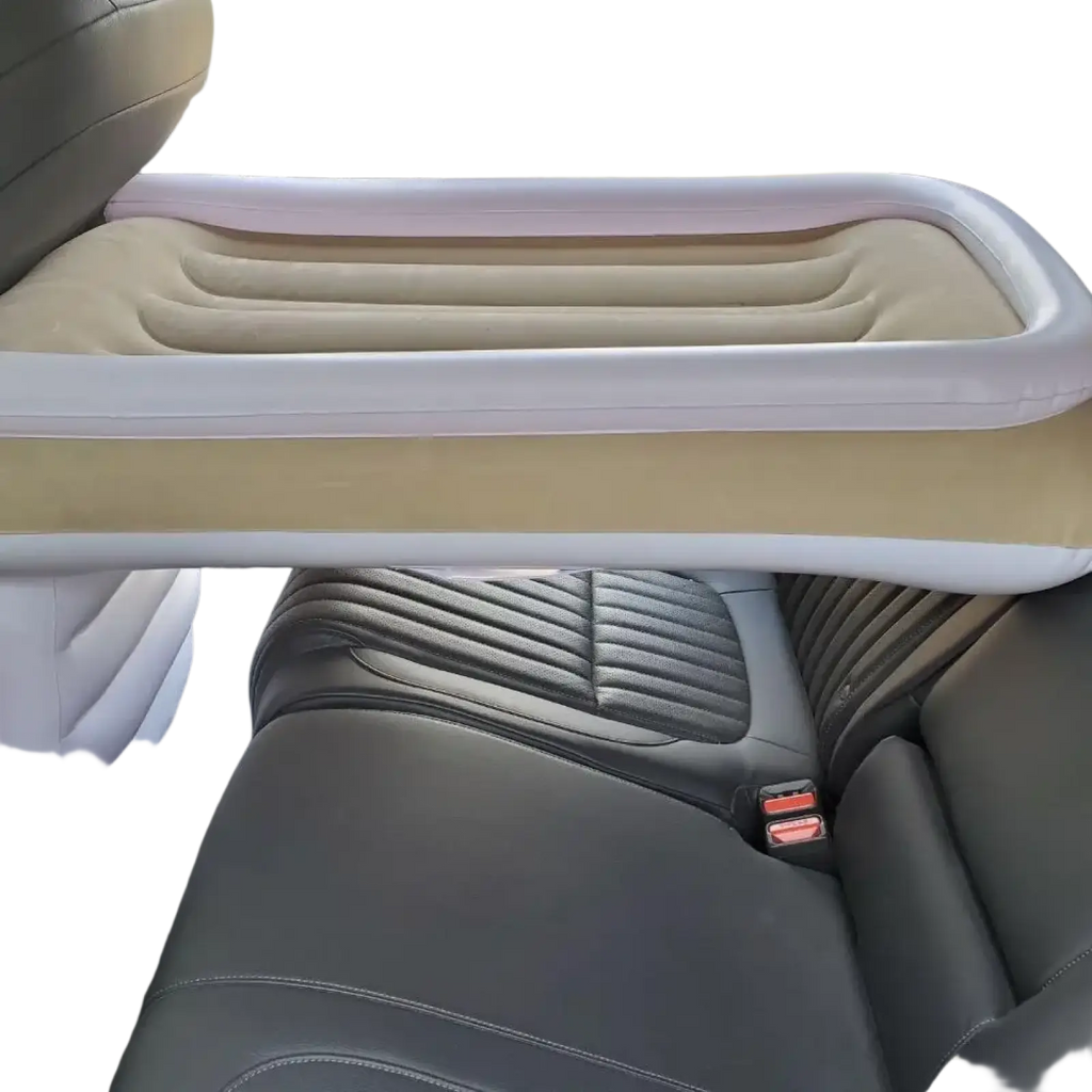 Inflatable beige and white ribbed car seat divider for portable toddler airplane bed and travel air mattress
