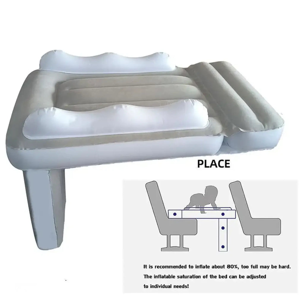Inflatable portable toddler airplane bed with white and gray sections and built-in pillow for comfortable travel sleep