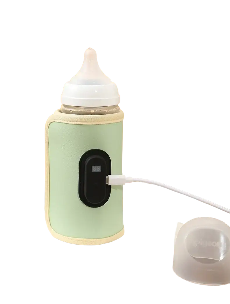 A mint green and cream portable USB baby bottle warmer with a digital display wrapped around a baby bottle