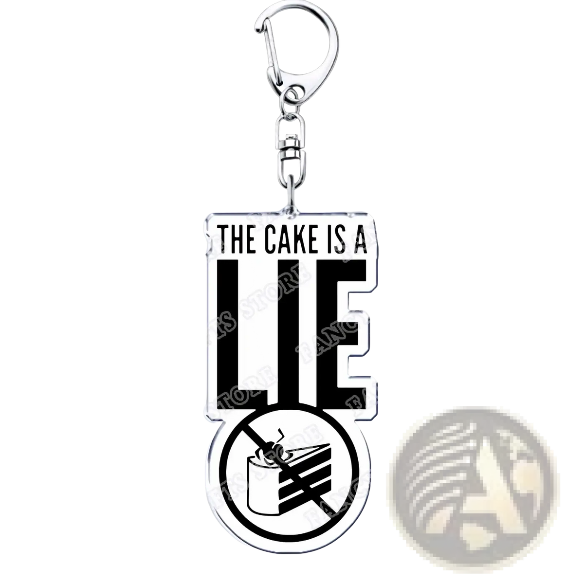 Silver acrylic Portal video game keychain with the phrase the cake is a lie and crossed-out cake emblem