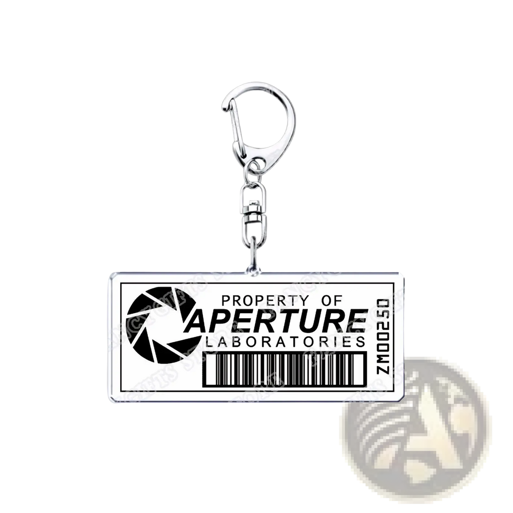 Silver rectangular acrylic keychain with black and white property of aperture laboratories logo and barcode portal gamer gift