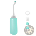 A mint green plastic postpartum peri bottle with a white flexible nozzle and interchangeable spray tips for perineal care