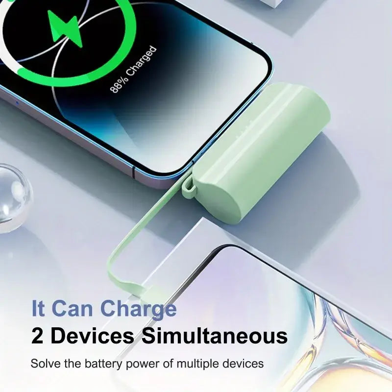 Mint green cylindrical power bank with soft silicone finish and carrying loop for portable mobile power charging