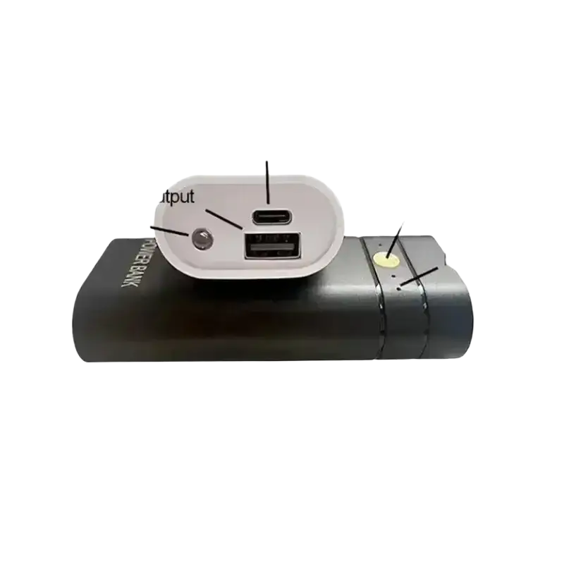 Black cylindrical power bank box with 6000mAh capacity featuring usb-c and usb-a output ports for electronic charging