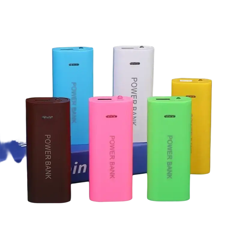 A collection of colorful power bank cases for 2-cell 18650 batteries in blue white pink green yellow and brown hues