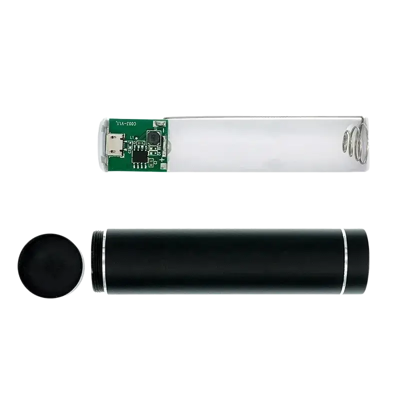 Black cylindrical power bank diy kit with silver accents and transparent top showing internal circuit board 5v 1a 18650 battery case
