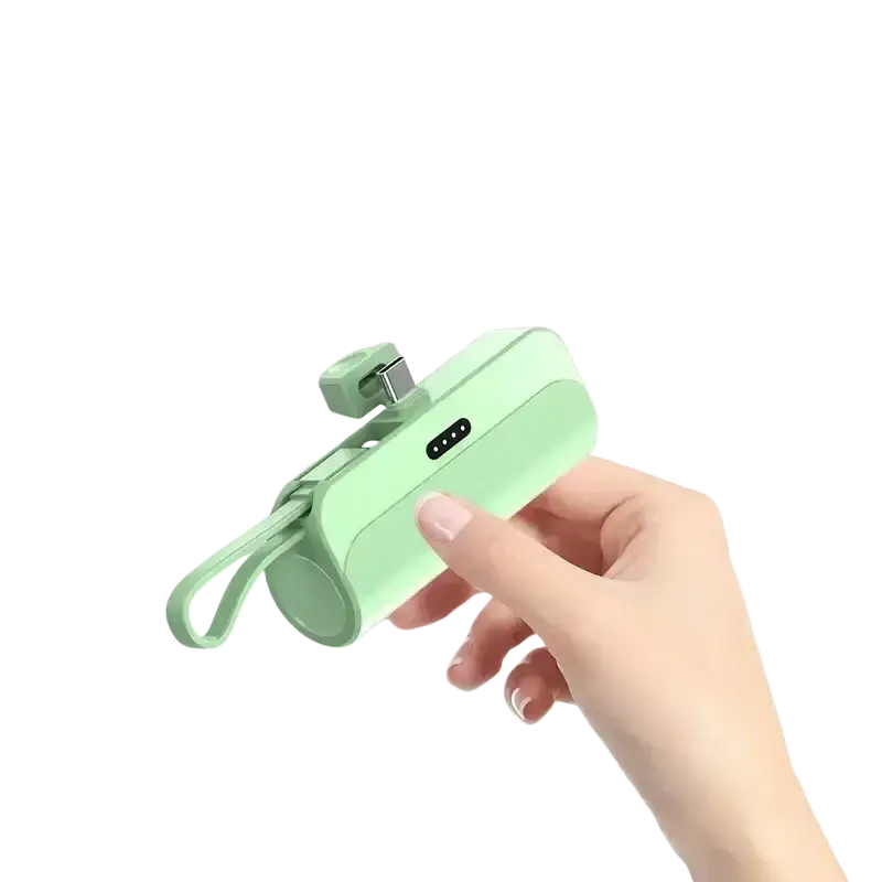 A mint green portable mini power bank with quick charge, built-in USB-C port, and wrist strap for easy carrying