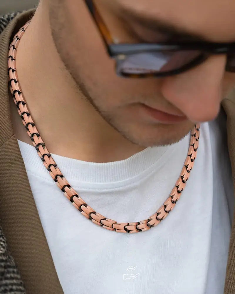 Classic rose gold magnetic copper therapy chain necklace featuring a sleek interlocking modern design