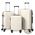 Set of three cream-colored premium pp hardshell spinner suitcases with black trim and textured vertical ridges